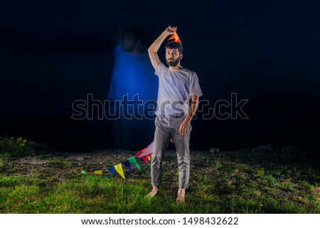 Full length portrait of excited happy cheerful positive handsome dancing young man in night