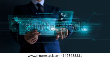 Businessman working financial trading and digital marketing with a cloud computing on modern virtual interface, cyber security, innovation and technology on dark background.