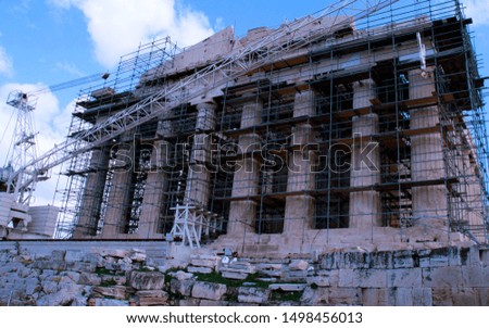 The Parthenon at the Acropolis in Athens, Greece covered in scaffolding while under restoration