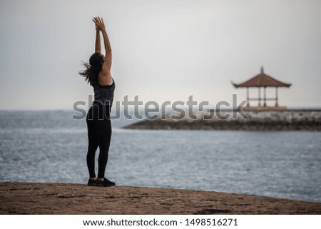 Yoga sport in the morning near Sanur Beach