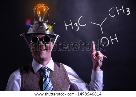 Nerd presenting handdrawn chemical formula of Isopropylalcohol isopropanol 2-propanol molecule Royalty-Free Stock Photo #1498546814