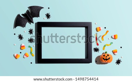 Halloween theme decoration with photo frame - overhead view flat lay