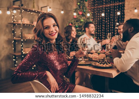 Portrait of nice attractive gorgeous glamorous shine smart stylish cheerful cheery positive guys having fun spending winter December vacation occasion congrats in decorated house room