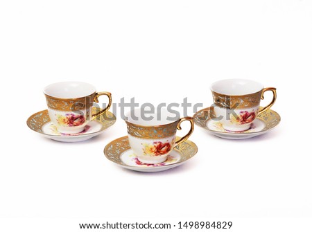 Traditional ceramic Turkish coffee glass set on a white background. Souvenir from Turkey. Studio product photoshoot.