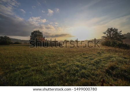 Landscape of meadow at sunrise in August , late summer, Lithuania