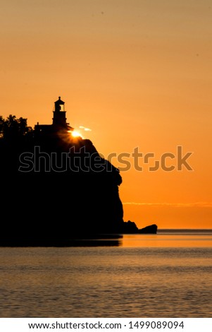 This picture is of the famous Split Rock Light House on the North Shore of Lake Superior. The sun was position perfectly behind the light house for the sunrise. 