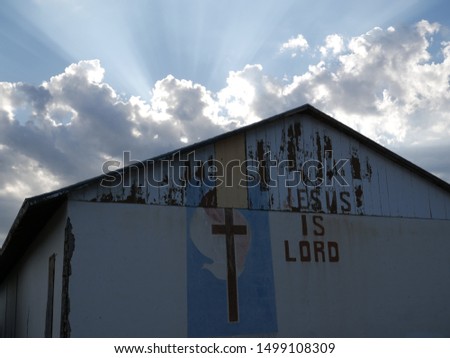Abandoned church with a heavenly sky behind it. Royalty-Free Stock Photo #1499108309