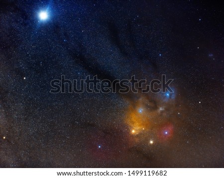 Rho Ophiuchi star cluster and nebula with Jupiter in the upper left corner