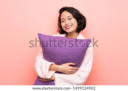 Asian young woman in pajamas