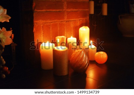 Lighting from candle stand on the floor, decoration  on house on Christmas day