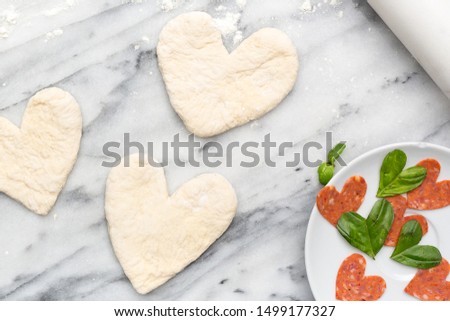 Heart Shaped Mini Pizza Dough on white background