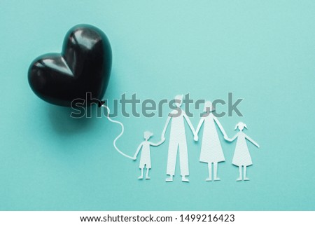 Family paper cut out and black heart balloon, causes and effects impact on child development and behavior of dysfunctional family, divorce parent, broken home concept, children mental  illness health Royalty-Free Stock Photo #1499216423