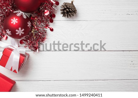 Christmas background with gifts boxes on wood white background. flat lay with copy space.