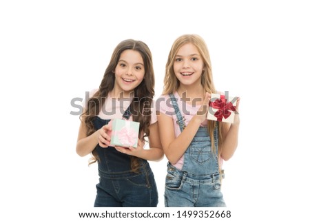 Girls sisters or friends hold gift boxes. Girls open holiday present. Children cheerful hold presents. Opening gifts. Perfect present for teens. Shopping day. Birthday present. For my dear friend.