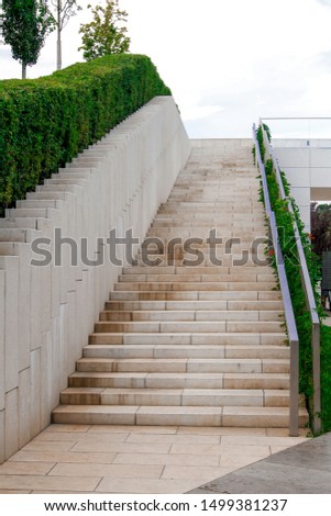 Stone staircase in the Park. Stairs in a green Park. Stone staircase in the city Park.