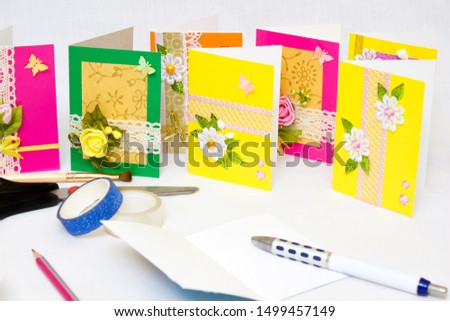 Beautiful varied handmade greeting cards - on a white background