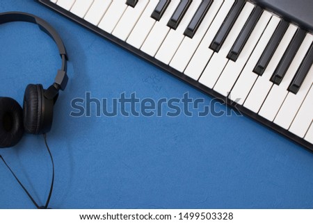 Musical keyboard and headphone, instrument mockup, top view