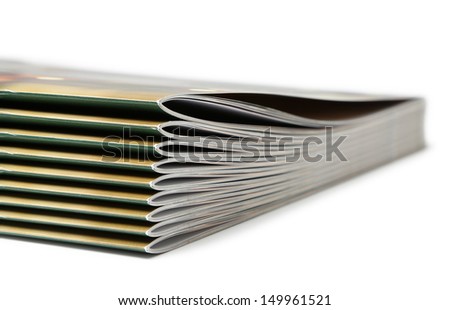 Stack of black covered magazines 