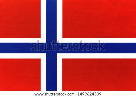 Norway national fabric flag, textile background. Symbol of international world european scandinavian country. State norwegian official sign. Royalty-Free Stock Photo #1499624309