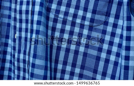 Dark blue and light blue shirt pattern in a small square
