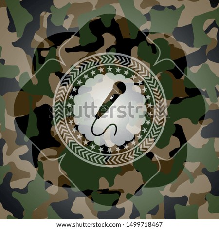 microphone icon inside camouflaged emblem