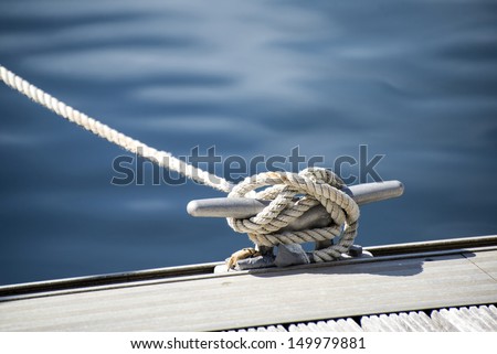 Yacht rope cleat detail image Royalty-Free Stock Photo #149979881
