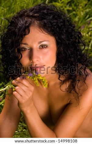 portrait of the beautiful girl with flowers