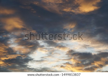 Sky and sunlight reflecting clouds