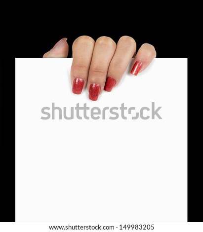 Hand holding paper isolated on black background