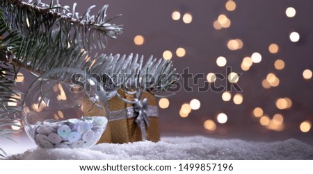 Christmas decorations banner. Snowy Fir-tree branch with Christmas lights bokeh. Panoramic background. Xmas composition. New Year 2020 holidays