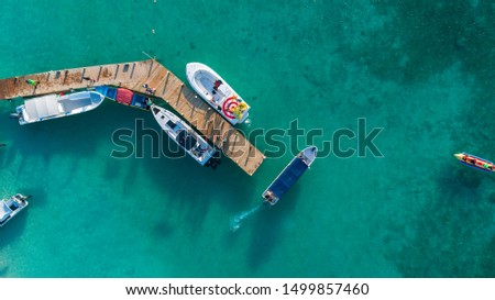 Aerial Shot Speed Boat in dock in Roatan Islas de la Bahia Honduras