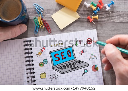 Seo concept drawn on a notepad placed on a desk