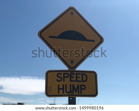 A Speed Hump public sign