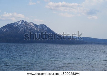 Landscape of Lake Shikotsu in the spring daytime in Hokkaido, Japan