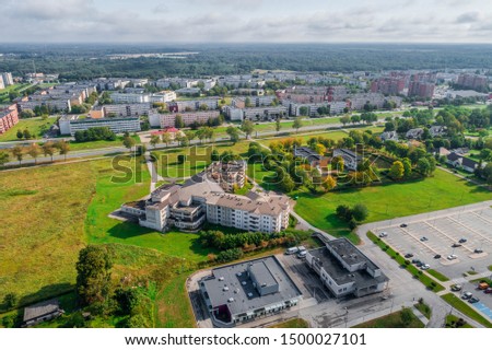 Aerial view of the city at summer morning. Beautiful summer city landscape. 