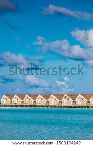 Tropical Maldives resort hotel and island with beach and sea for holiday vacation concept. Summer landscape of Maldives island, luxury water villas