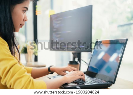 Programmers and developer teams are coding and developing software. Royalty-Free Stock Photo #1500204824