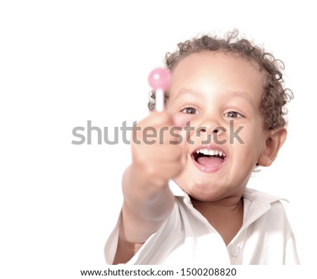 little boy with lollipop on white background stock photo