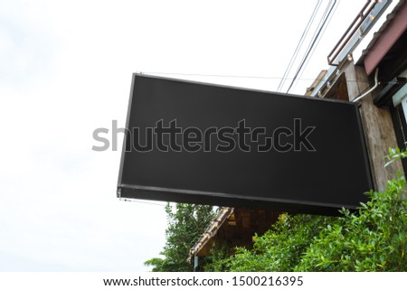 Hanging empty black sign board