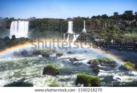 Puerto Iguazu, Brazil - 28 August, 2019: Tourists at Iguazu Falls, Foz do Iguacu, Brazil