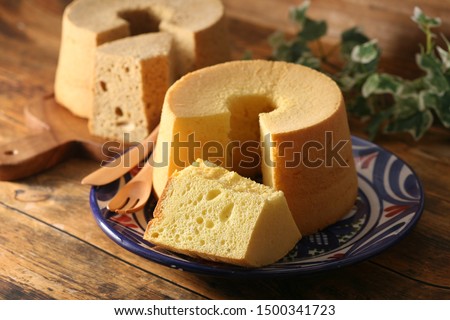 cut and eat a delicious chiffon cake Royalty-Free Stock Photo #1500341723