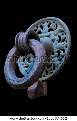 Decoration elements of buildings, antique iron doorknobs, keyhole, knockers and gong handle.