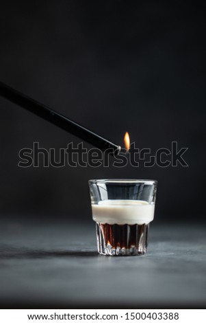 Layered shot B-52 on the dark background with fire