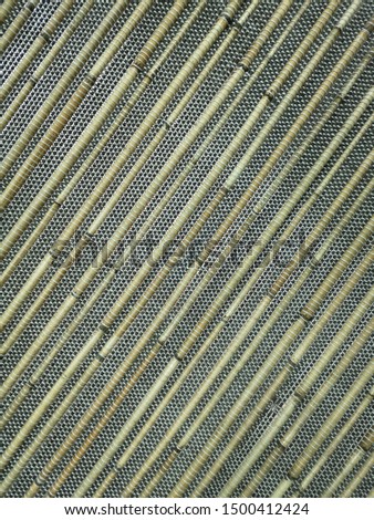 Woven fabric pattern inserted with reeds
