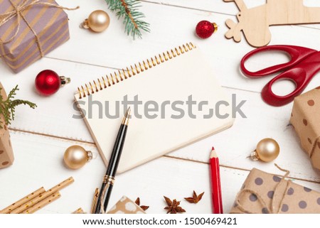 Process of making christmas and new year greeting cards, top view