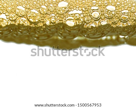 Super Macro Oxygen Gold Bubbles on white background Isolate and Copy space