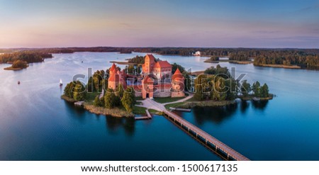 Trakai castle: medieval gothic Island castle, located in Galve lake. Flat lay of the most beautiful Lithuanian landmark. Trakai Island Castle - one of the most popular tourist destination in Lithuania Royalty-Free Stock Photo #1500617135