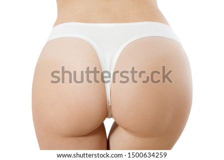Butt lift and anti cellulite woman body concept. Bikini white panties on female close up isolated on white background. Plastic surgery and liposuction. Cropped image. Skin care and bodycare. Healthy