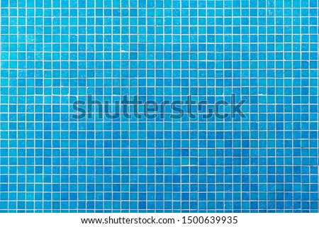 Blue mosaic tiles texture background.
