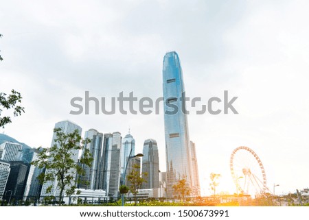 Ferris wheel and office buildings in Hong Kong.